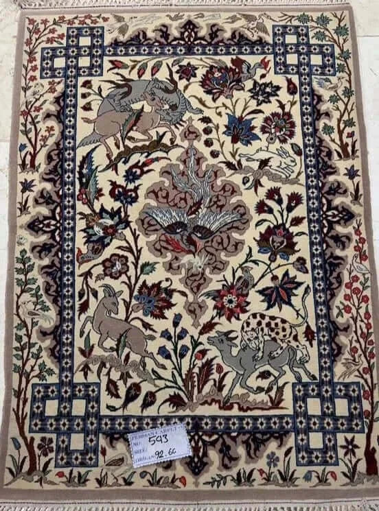 "Hand-knotted Persian rug from Isfahan, 90x60 cm, crafted with wool and silk, featuring 1,000,000 knots per square meter, a perfect addition to any home decor."